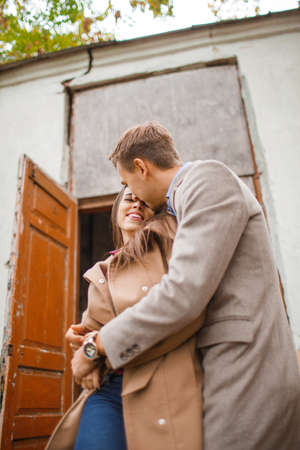 Lovely happy couple walking on the street together.の写真素材
