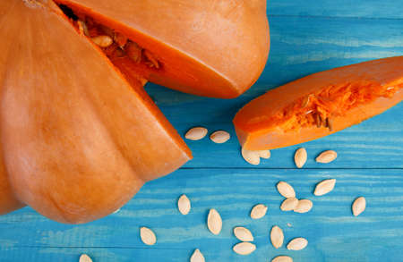 Big tasty pumpkin on the blue background. Food concept.の写真素材
