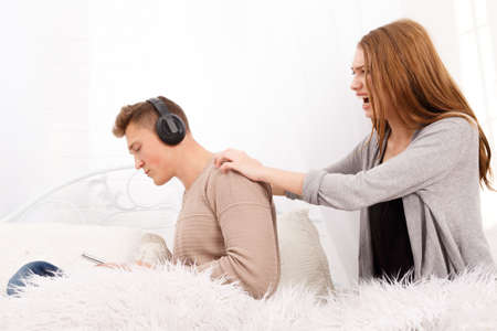 The quarrel of a guy and a girl. A young couple swears. The concept of quarrels in families.