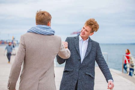 Best friends boys having fun outdoors together.の写真素材