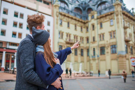 Lovely young couple tours in an unfamiliar cityの写真素材
