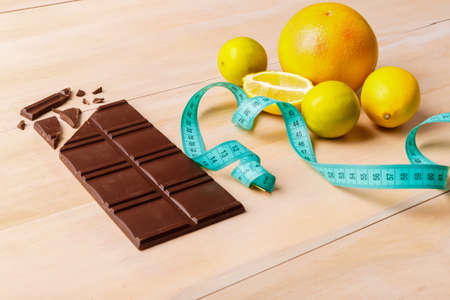 Black chocolate with fruit on the tableの写真素材