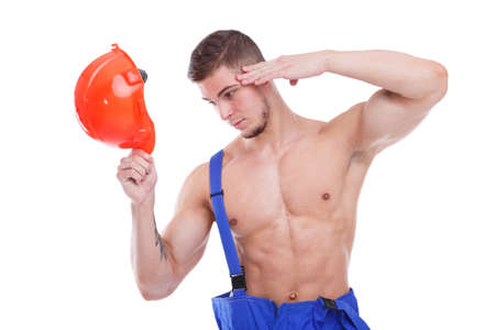 A man in uniform with a helmet. Isolated over white backgroundの写真素材