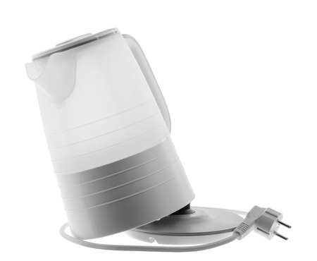 Electric kettle stands at an angle on delivery on a white isolated backgroundの写真素材