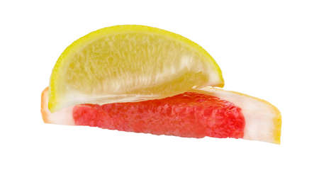 Sliced grapefruit and lemon isolated on white background