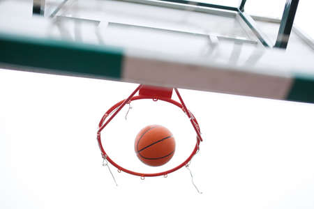 Basketball, bright, new ball flies into the ringの写真素材