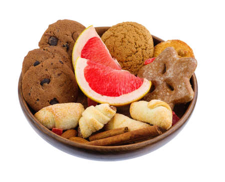 Plate with delicious pastries on a white isolated background