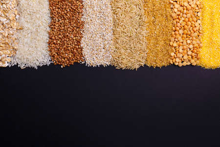 Set of cereal grain from the top close up on a black backgroundの写真素材
