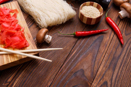 On a table set of products for cooking Chinese noodles. Indoors.の写真素材