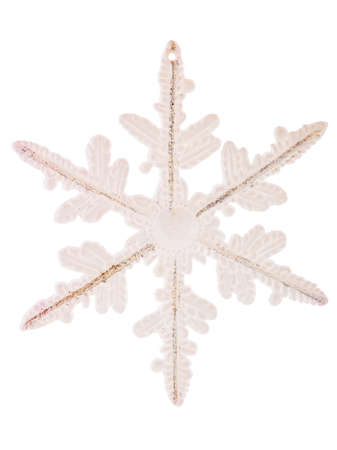 Close-up of one translucent pink, silicone snowflake isolated on white background, new year concept, christmas.の写真素材