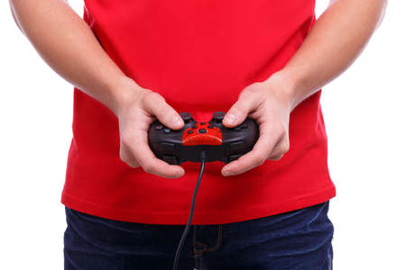 Hands holding joystick on white isolated background. Front view