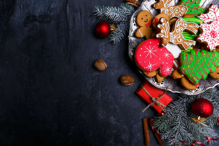 Dark background and with a layout in the corner of a Christmas cookie. View from above.の写真素材