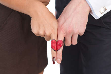Two halves of the heart part of the girl and part of the guyの写真素材