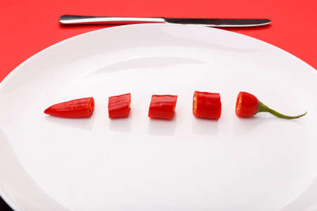 On a plate, chopped chili peppers. Inside.の写真素材
