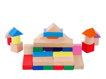 Wooden toys, child development, cubical multi-colored castle, with towers, lined up for the child, front view, isolated on white background.の写真素材