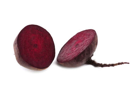 Close-up of freshly sliced beetroot isolated on white background. Healthy food concept.の写真素材