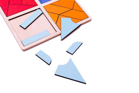 Educational colorful geometric figures. Ecological wooden toys for children concept isolated on a...