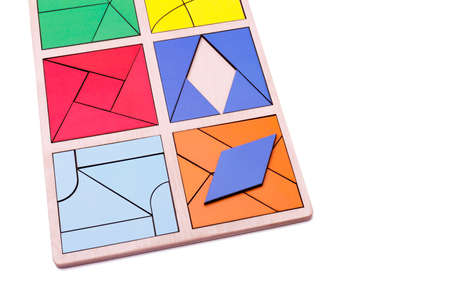 Educational colorful geometric figures. Ecological wooden toys for children concept isolated on a...