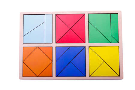 Educational colorful geometric figures. Ecological wooden toys for children concept isolated on a white background.の写真素材