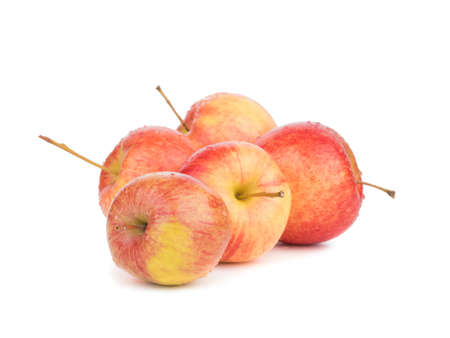 A heap of juicy, fresh and organic apples isolated on a white background. Healthy fruits full of vitamins.の写真素材