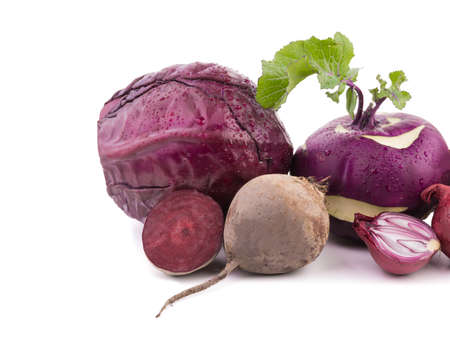 Whole purple head of red cabbage, onion, beet, turnip, radish, isolated on a white background. A concept of organic vegetablesの写真素材