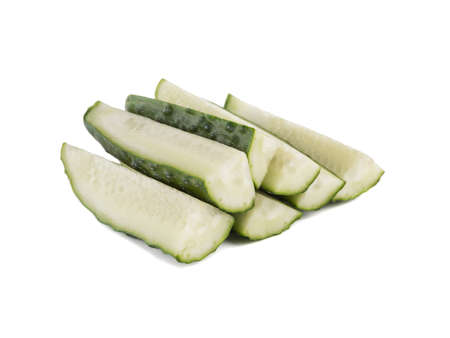A group of sliced cucumbers isolated on white background, close up. The concept of ripe and fresh vegetables.の写真素材
