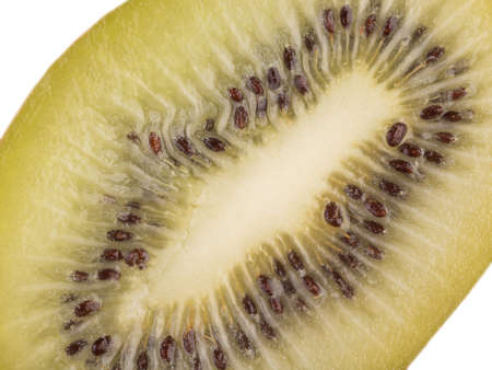 Top view of a sliced ripe and fresh kiwi with black seeds isolated on a white background. A concept of exotic fruits full of vitamins, closeupの写真素材