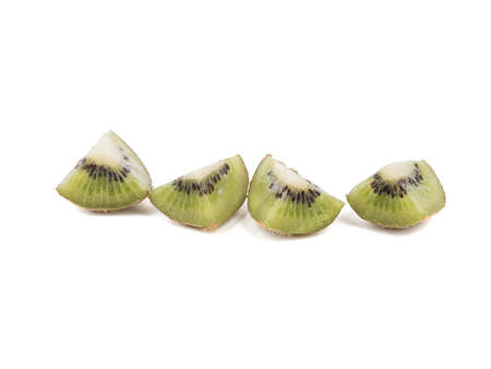 Sliced ripe kiwi with seeds isolated on a white background. A concept of exotic fruits full of vitaminsの写真素材