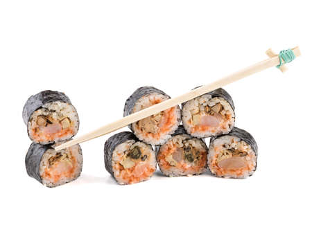 A set of sushi rolls with chopsticks isolated on white background. A concept of seafood and Japanese cuisine.の写真素材