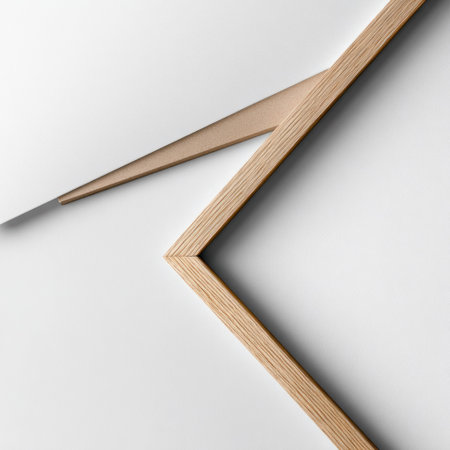 Angled close-up of light wood elements on a white surface, creating a minimalist designの素材