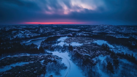A panoramic view of the frozen wilderness, showcasing snow-covered forests and distant mountains under twilight skies. A winding road leading through the landscape adds depth to the scene. Captured with a DJI Mavic Air 2 drone camera. --chaos 30 --ar 16:9 --v 6.1 Job ID: 8934b988-2a88-4f1d-b9bc-abeadae035cbの素材