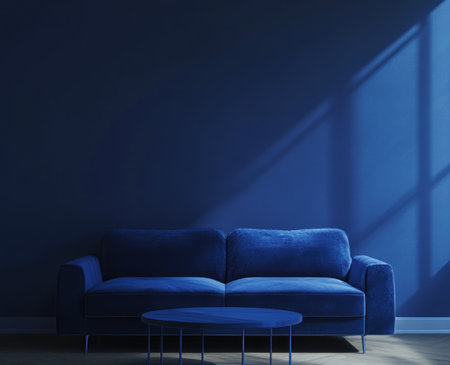 Blue sofa and coffee table against a dark blue wall in a living room, 3D rendering, minimalist style, soft lighting, high-resolution photography, professional color grading, clean, sharp focus, high-quality details, close-up, natural light, bright tones, fine textures, realism, Octane render. --ar 37:30 --v 6.1 Job ID: d5daf515-4016-4100-aabe-5353a6016936の素材