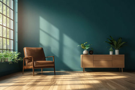 A modern room with teal walls, wooden flooring, and a brown leather armchair. A sideboard is placed on the wall to one side of the chair. There are also plants in vases on both sides of the chair. The lighting casts soft shadows over the scene, creating depth. This image captures a minimalist yet cozy atmosphere, perfect for interior design or home decor. --ar 3:2 --v 6.1 Job ID: 134e9808-75d2-4c57-b9d2-45f658baf500の素材
