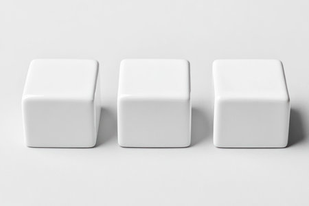 3 white cube pedestals, simple background, 2D illustration, minimalistic, flat lay on a light gray solid color surface --ar 3:2 --v 6.1 Job ID: ba0fedeb-5fea-4fe0-937e-b62ac03e979dの素材