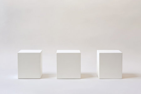 3 white cube pedestals, 2D flat illustration, plain background, minimalist, simple, white color palette, high resolution, high contrast, sharp focus, professional photograph --ar 3:2 --v 6.1 Job ID: 008e320e-c6b0-4e1a-b77e-ea916fede36dの素材