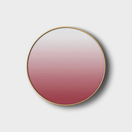 Circular mirror with a gradient from white to rose-red. Gold frame and shadow on whiteの素材
