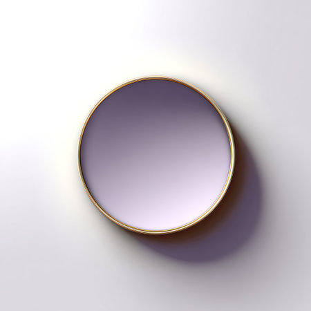 A top-down view of a circular, lavender-colored dish with a gold rim on a white surfaceの素材