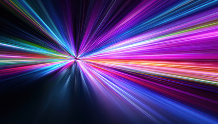 Radial abstract of vibrant streaks of light bursting outwards from a central pointの素材