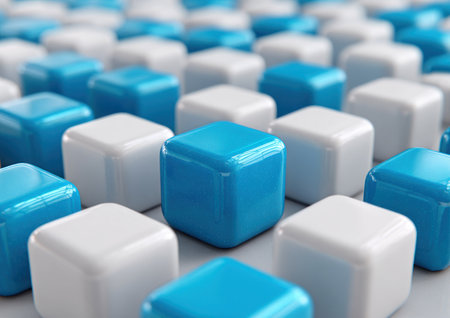 Close-up of glossy, 3D cubes in blue and white, arranged in a grid-like patternの素材