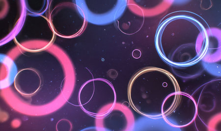 Glowing neon rings, various sizes &amp; colors, float against a dark, speckled backgroundの素材