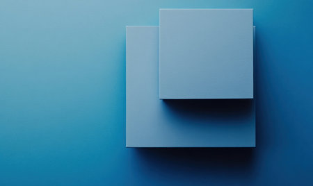 Two blue square cards stacked on top of each other, in a simple minimalistic 3D rendering style, with a solid background color and blue monochromatic colors. --ar 5:3 --v 6.1 Job ID: 6c3ce170-fde6-40ac-9fc1-649c87abd221の素材