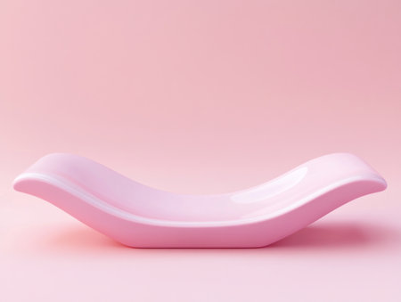 Abstract pink podium with curved shapes for product presentation, modern design, simple background, high-resolution photography, incredibly detailed. --ar 4:3 --v 6.1 Job ID: a20a0853-e4bc-488e-8eb0-04f4c5c447b3の素材