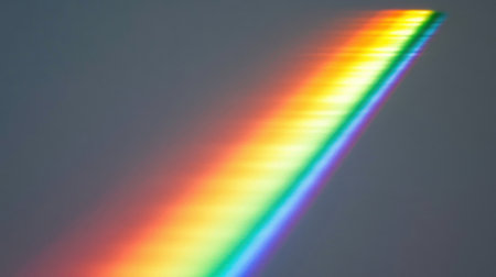 A single, thin arc of colorful, vibrant light forms a rainbow on the right side against a gray background. The rainbow has a soft glow that adds depth to its hues, and it is depicted as being slightly curved upwards towards the top left corner of the frame, giving it an elegant appearance. There are no other elements in front of or behind the rainbow, allowing all attention to be focused on its beauty and color saturation. This scene captures the serene and natural essence of rainbows, with a focus on their ethereal quality. --chaos 30 --ar 16:9 --v 6.1 Job ID: adfa0e0d-70be-4df0-b0a9-971d48afbebaの素材