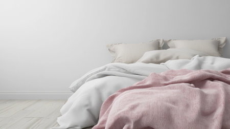 White wall background, white bed with pink and beige bedding, wooden floor in the minimalist interior design of a modern bedroom. --chaos 30 --ar 16:9 --v 6.1 Job ID: 04f7a1cd-53fb-4a84-800f-8cf1f42fec0bの素材