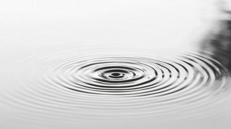 White water ripples in the background, top view. Soft focus on the white water surface with a circular wave pattern. Water texture banner for cosmetic product advertising, beauty, and spa concepts. Close-up of water ripples in a gray liquid. --chaos 30 --ar 16:9 --v 6.1 Job ID: d8652c30-5fb0-4652-ad33-b054057045d9の素材