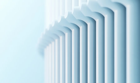 A close-up of the top corner of white vertical panels, arranged in an angled and spiral pattern. The background is light blue with a gradient effect that transitions from warm to cool tones. This scene creates depth through the perspective of looking up at it. --ar 5:3 --v 6.1 Job ID: e0a7f5ec-67c2-4713-b0a0-46db722009beの素材