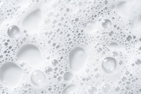 White background with the texture of soap foam, bubbles, and water drops, top view. Banner template for washing machine or shampoo product advertising. --ar 3:2 --v 6.1 Job ID: 048145ce-6382-49eb-a1aa-b35a939a106fの素材