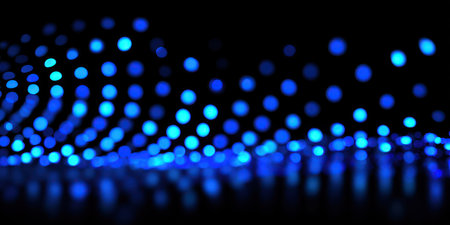 This image presents an abstract background of blue bokeh lights on a black backdrop. The scene showcases blurred orbs of varying shades of blue, creating a sense of depth. This visual composition could be employed in various digital contexts such as website backgrounds or design elements. The use of color and blur evokes a mood and adds artistic flair.の素材