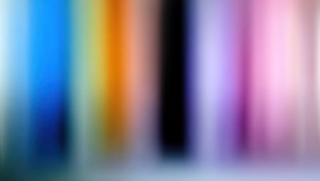 This image presents a vibrant abstract composition formed by vertical bands of color. The blurred stripes include blue, yellow, orange, and pink hues. The visual style suggests a modern approach, possibly for use in design projects. It may serve for various applications such as websites, presentations, or print designs.の素材