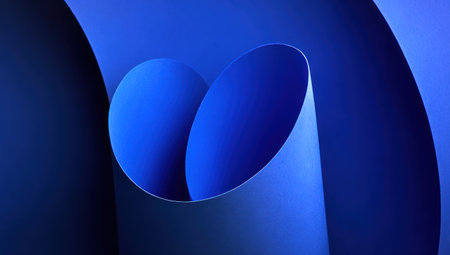 This abstract image presents a composition of layered, rolled blue paper. The curves and shadows create depth and form, highlighting the interplay of light and texture. This type of image is suitable for a variety of uses, including website backgrounds, graphic design elements, and conceptual art.の素材